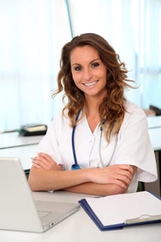 Portrait of beautiful smiling nurse at work