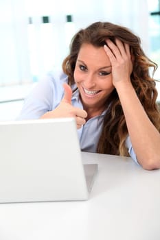 Happy businesswoman with positive attitude