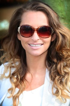 Portrait of beautiful woman in town