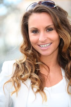 Portrait of beautiful woman in town