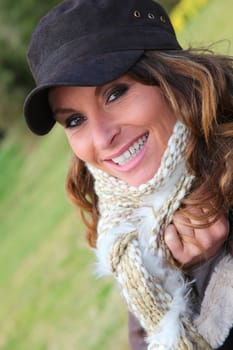 Portrait of beautiful woman with baseball cap