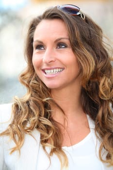 Portrait of beautiful woman in town