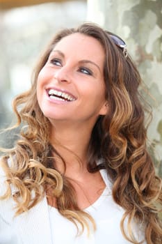 Portrait of beautiful woman in town