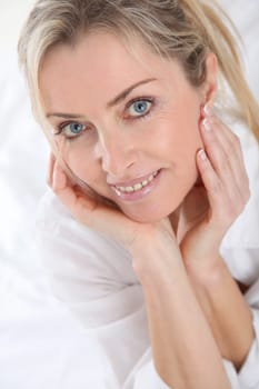 Portrait of beautiful blond woman in the morning