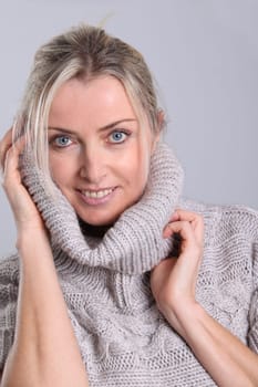 Beautiful woman wearing turtleneck sweater