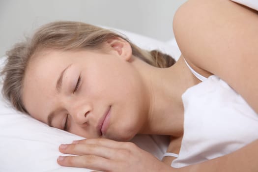 Closeup of young girl asleep