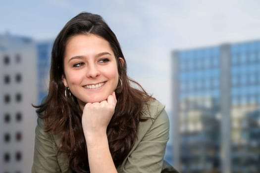 Closeup of teenage girl sitting on a school bench