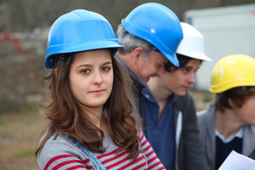 Portrait of teenager with security helmet