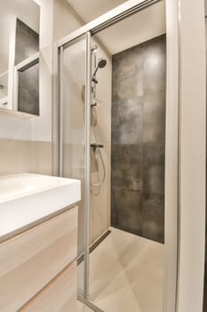 a bathroom that is very clean and ready to use as a shower stall or room divider for the toilet
