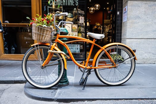 MELBOURNE, AUSTRALIA - MARCH 26 2023: Melbourne's famous Degraves St with bike on an overcast autmn morning in Melbourne, Australia