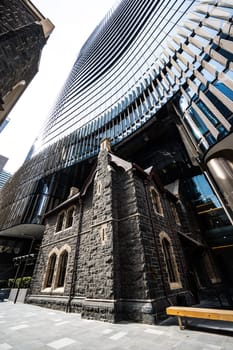 MELBOURNE, AUSTRALIA - MARCH 26, 2023 - Architectural details in Melbourne's Wesley Place and the Manse on a sunny autumn day in Melbourne, Victoria, Australia