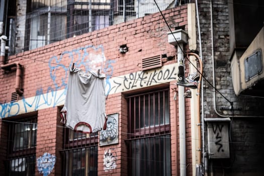 MELBOURNE, AUSTRALIA - MARCH 26 2023 -Street art and graffiti in Presgrave Place, near Collins St in Melbourne CBD on a spring morning in Victoria, Australia
