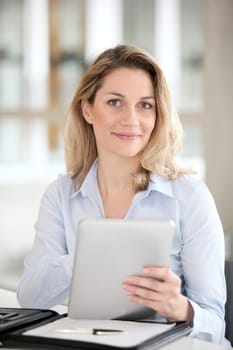 Office worker using electronic tab