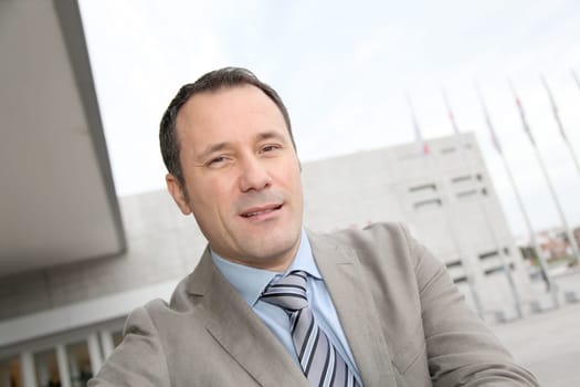 Businessman standing outside the office