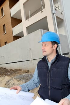 Construction manager on building site