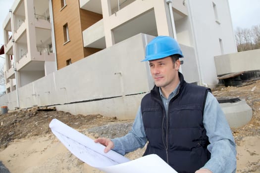 Construction manager on building site