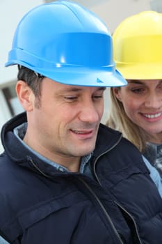 Closeup of architects with security helmets
