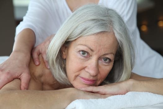 Senior woman having a massage