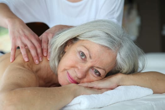 Senior woman having a massage