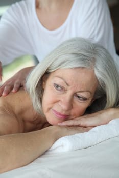 Senior woman having a massage