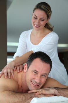 Handsome man having a massage