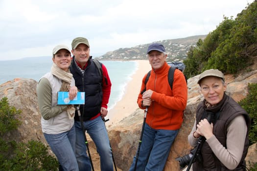 Group of hikers standing in natural trail