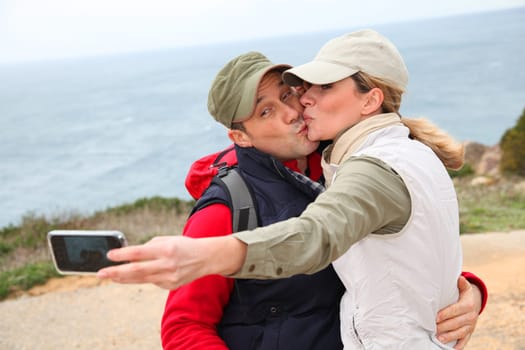 Couple of hikers taking picture of themselves