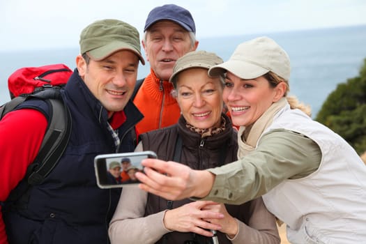 Group of hikers taking picture of themselves