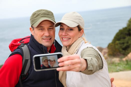 Couple of hikers taking picture of themselves