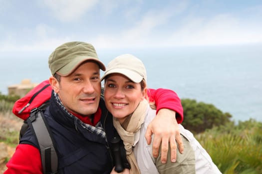 Portrait of happy couple on hiking day