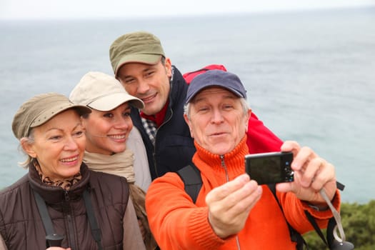 Group of hikers taking picture of themselves