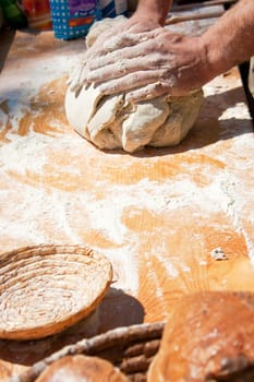 Baker kneading dough made with biological products