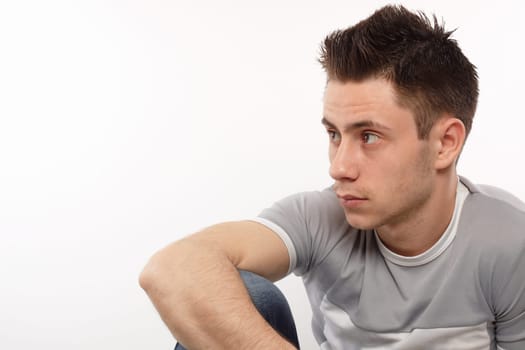 Young sportsman looking on his right side