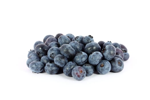 Heap of sweet juicy blueberries isolated on white