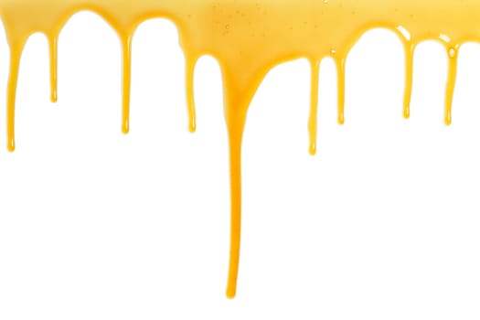 Honey flowing over white background