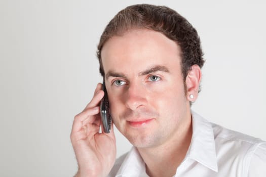 Portrait of young man talking on his cellphone