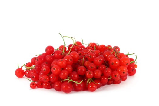 Heap of red currants, isolated on white background