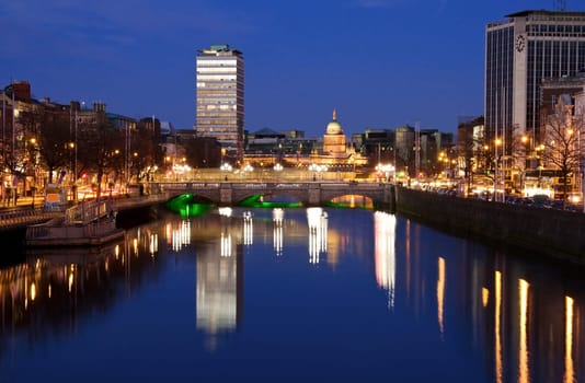 Dublin city at sunset with view over O&#039 Connell Bridge and Liffey river.