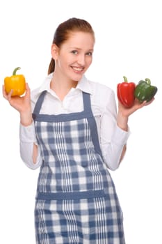 Studio shot of a young woman with a chef's apron