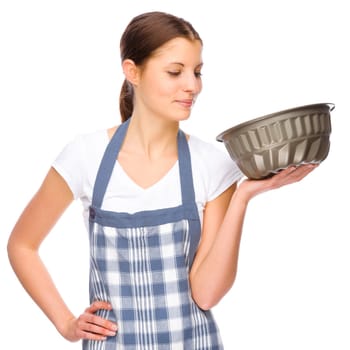 Studio shot of a young woman with a chef's apron