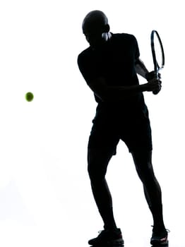 man african afro american playing tennis player backhand, on studio isolated on white background