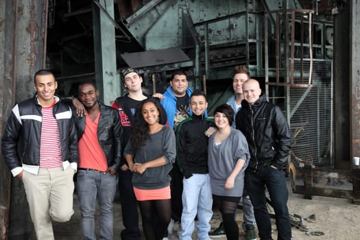 Group of nine young people from different backgrounds - All smiling and having fun