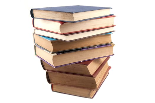 Old book stack isolated on white background