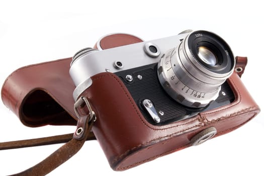 Used vintage film camera in leather case