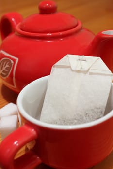Red cup and teapot