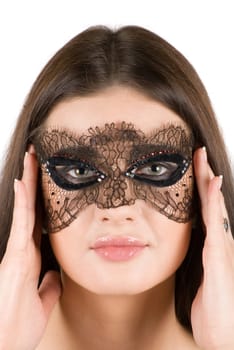 girl at mask closeup on a white background
