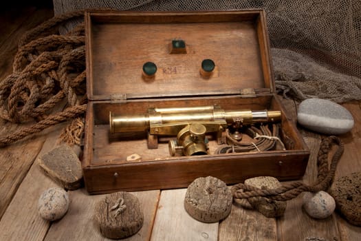 Antique telescope in wooden box