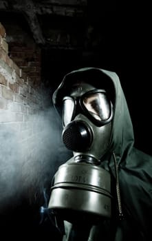 Bizarre portrait of man in gas mask