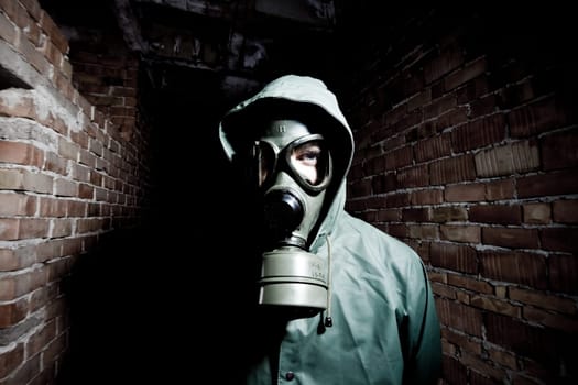 Bizarre portrait of man in gas mask