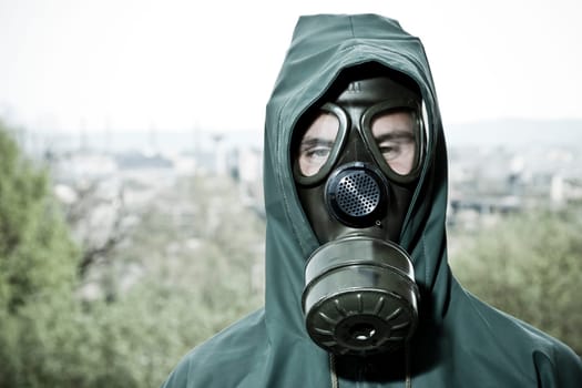 Bizarre portrait of man in gas mask